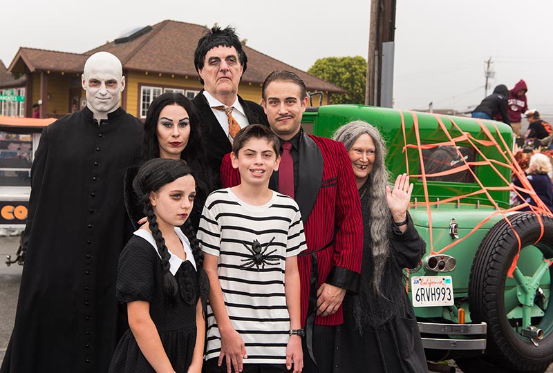 Costume Contest participants dressed as The Addams Family at the Half Moon Bay Art & Pumpkin Festival